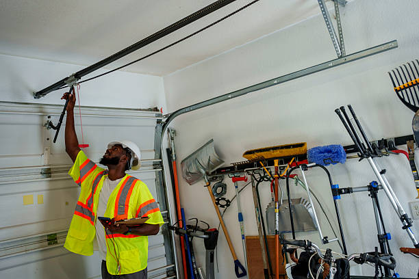 Professional Garage Door Panel Replacement technician working in Stockton, UT